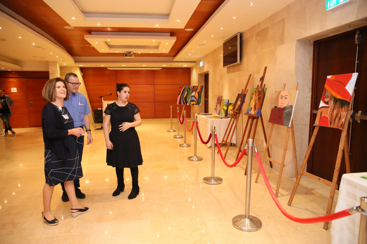 Noy Sol Azulai at her drawing exhibition, together with Professor Myriam Ben Arush, Director of Ruth Rappaport Children's Hospital, and Professor Ram Weiss, Director of the Departments of Pediatrics A and Noy Sol Azulai at her drawing exhibition, together