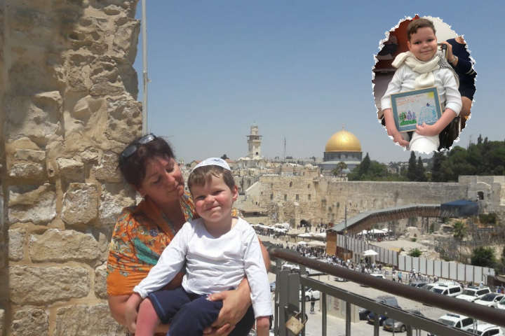Michael and his mother at the Western Wall. Inset: Michael with a photo he drew for Professor Eidelman. Photography: Rambam HCC