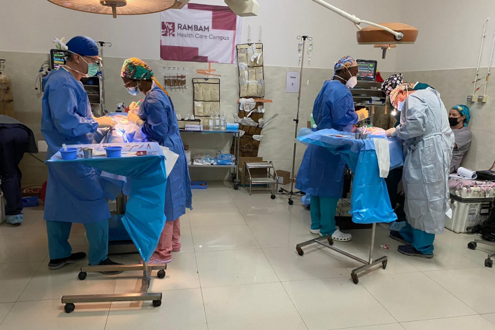 Dr. Omri Emodi and Dr. Zach Sharoni performing life-changing surgery in Madagascar. Photography:  Rambam HCC