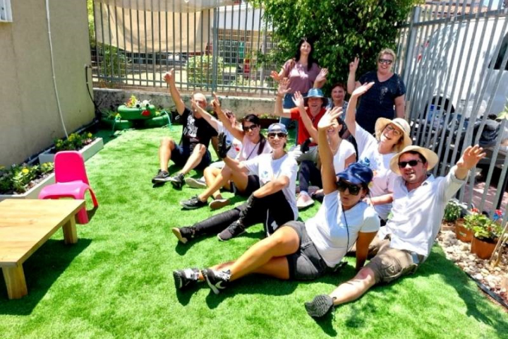 Rambam’s Purchasing Department staff at the end of the restoration project of the Alvin Network Garden in Kiryat Bialik. Photography: Rambam HCC
