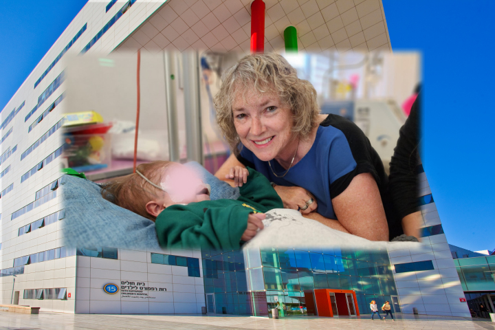 Debbie Block-Tamin with one of the babies she regularly hugs. Ruth Rappaport Children's Hospital in the background.  Photography: Rambam HCC.
