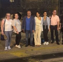 Professor Ullmann (R) with other hospital staff after disembarking at Haifa Port.