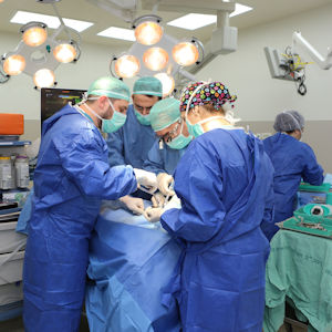 Doctors during the surgical procedure
performed for the first time ever,
in Israel, at Rambam.
Photo Credit: Pioter Fliter