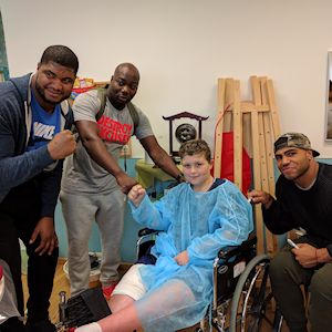 Delanie Walker, Mychal Kendricks, and 
Cameron Jordan with a patient in the 
Ruth Rappaport Children’s Hospital at Rambam.
Photographer: Netanel Ayzik, Spokespersons Office, 
Rambam HCC.